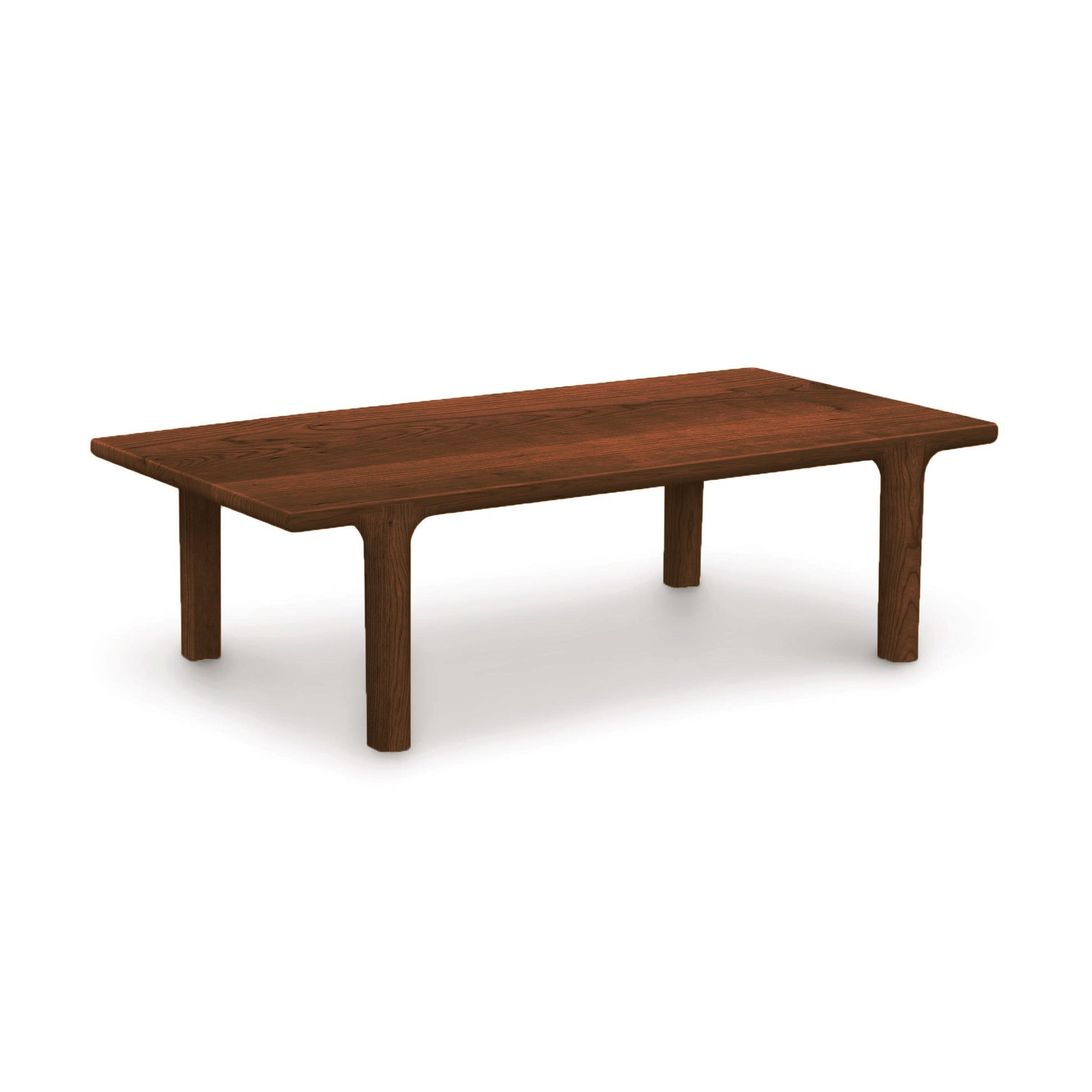 A solid North American hardwood Sierra Rectangular Coffee Table with four legs on a white background, part of the Copeland Furniture Sierra Rectangular Coffee Table series.