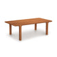 A simple Copeland Furniture Sierra Rectangular Coffee Table made from North American hardwood, featuring a contemporary design with four legs, isolated on a white background.