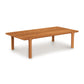 A solid North American hardwood Copeland Furniture Sierra Rectangular Coffee Table with four legs, isolated on a white background.