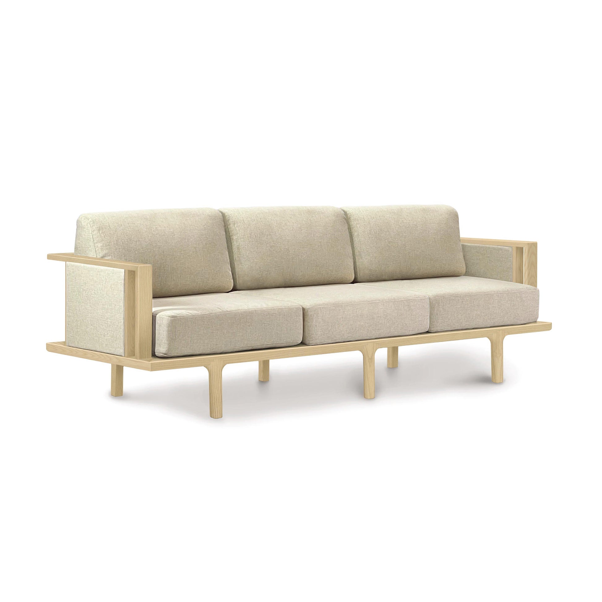 A modern Copeland Furniture Sierra Oak Upholstered Sofa with Upholstered Panels and cushions displayed against a white background.