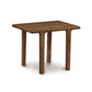 A Sierra Rectangular End Table by Copeland Furniture, with two legs on a white background.