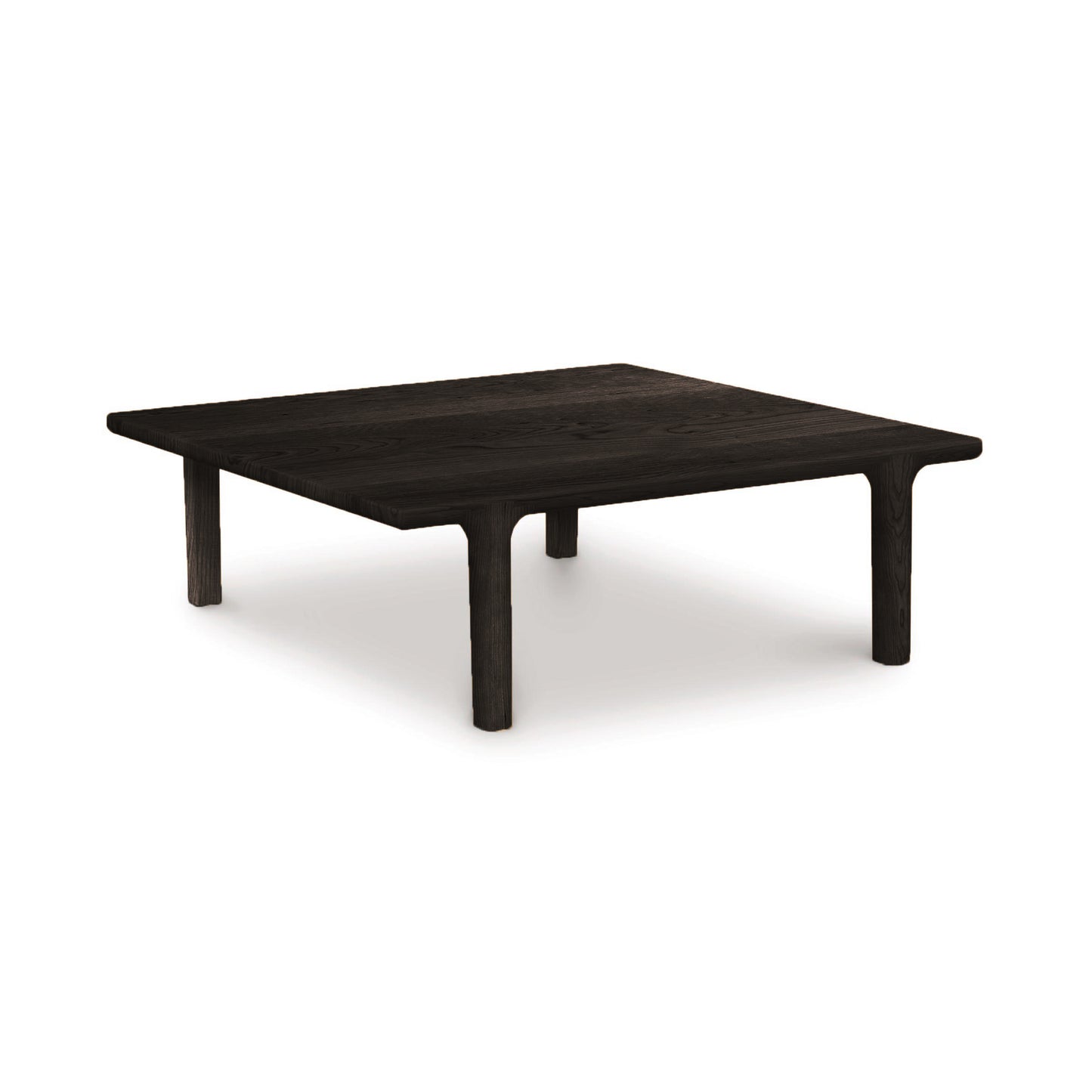 A contemporary Sierra Square Coffee Table by Copeland Furniture with legs.
