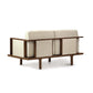 A modern "Sierra Walnut Upholstered Loveseat with Upholstered Panels" by Copeland Furniture, with a wooden frame and beige fabric.