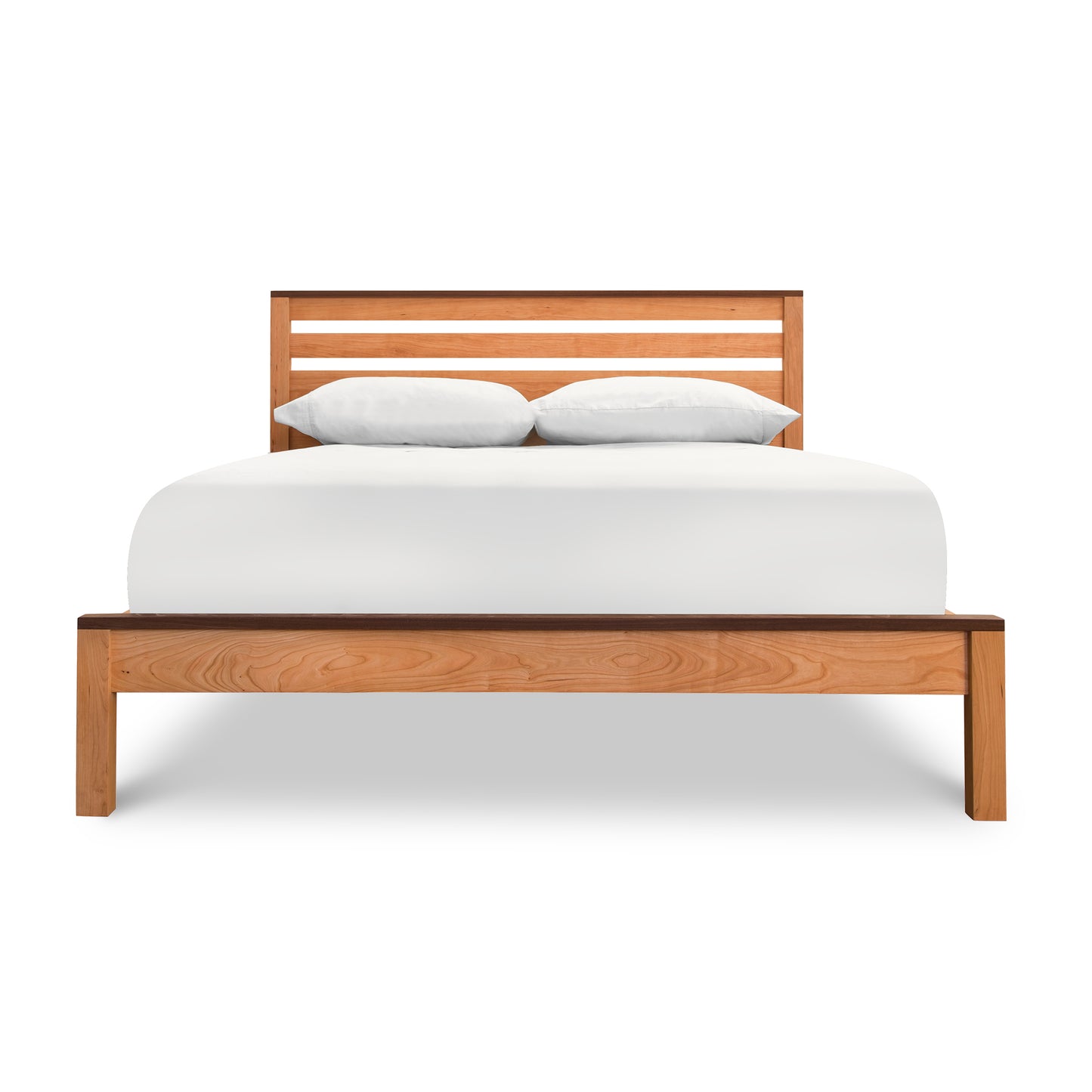 An eco-friendly Skyline Panel Bed - Queen - Ready to Ship made by Vermont Furniture Designs, with a white sheet on top.