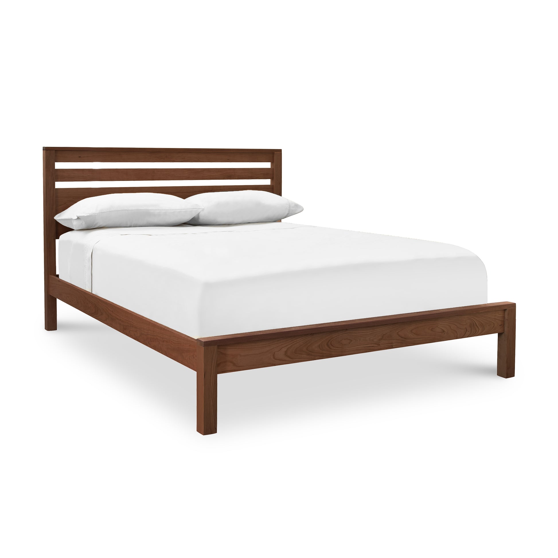 Vermont Furniture Designs' Skyline Panel Bed with a slatted headboard and eco-friendly oil finish.