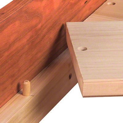 A piece of wood with a hole in it.