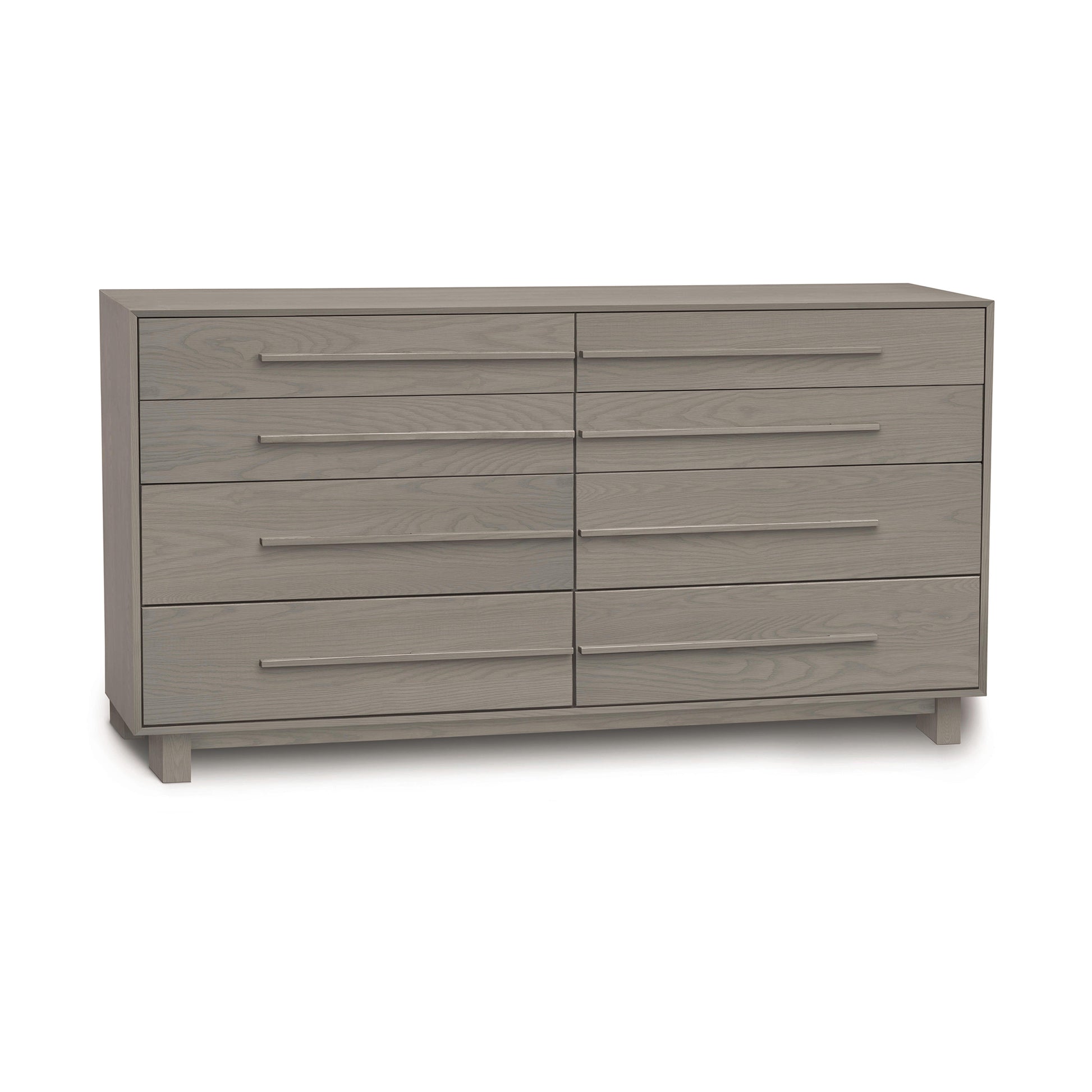 The Copeland Furniture Sloane 8-Drawer Dresser, a gray dresser with drawers, adds contemporary style to any bedroom setting.
