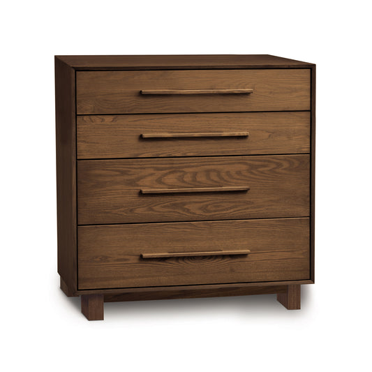 A contemporary wooden four-drawer dresser with horizontal handles on a white background from Copeland Furniture, named the Sloane 4-Drawer Chest.