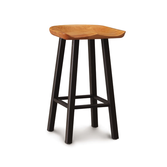 A Copeland Furniture Modern Farmhouse Tractor Counter Stool with a natural wood finish seat and black legs, isolated on a white background.