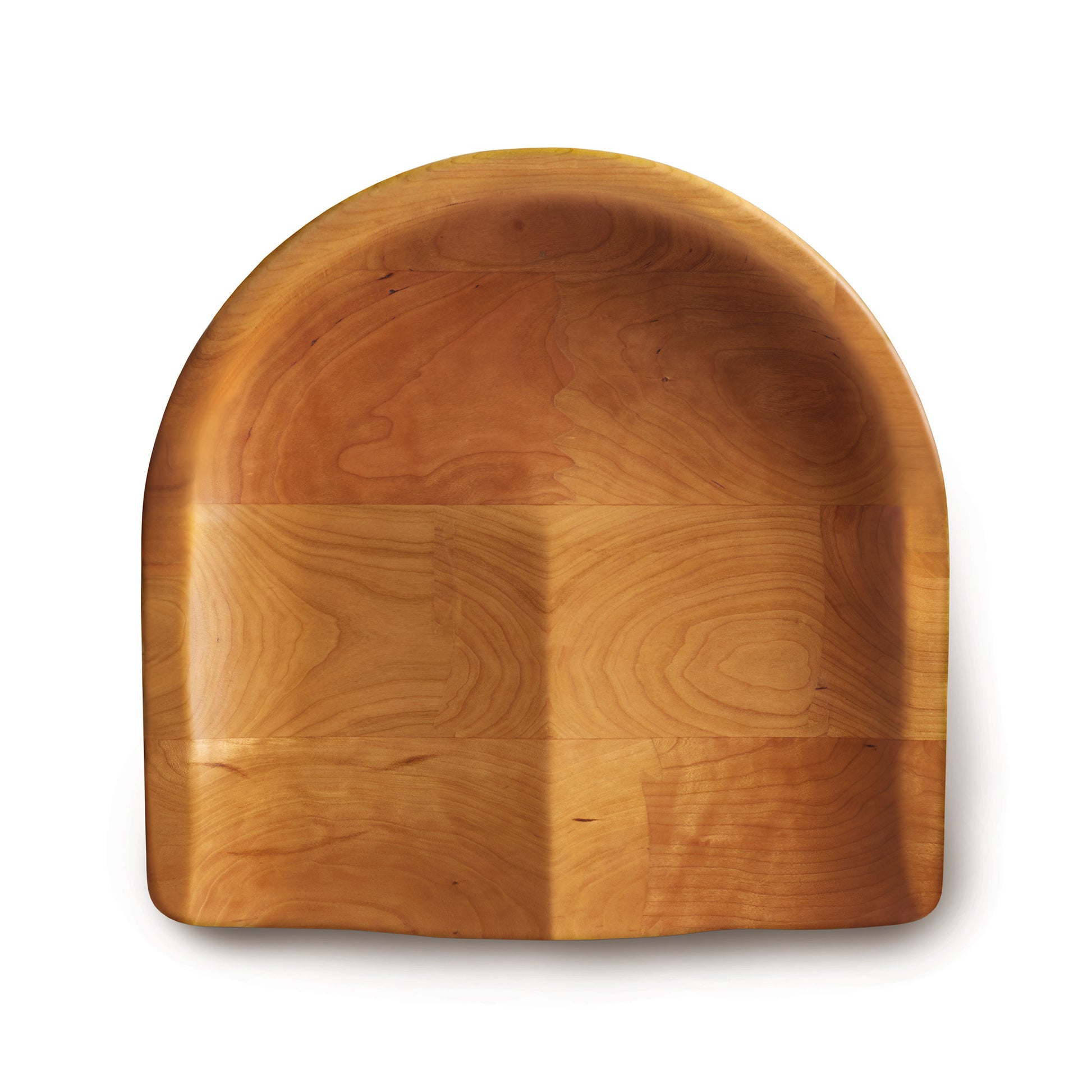 A Modern Farmhouse Tractor Seat Chair from Copeland Furniture with a curved top and a natural wood grain pattern, isolated on a white background, showcasing a contemporary style.