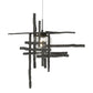 The Tura Seeded Glass Mini Pendant by Hubbardton Forge highlights artisan-made craftsmanship with bold black bars and a geometric silhouette.
