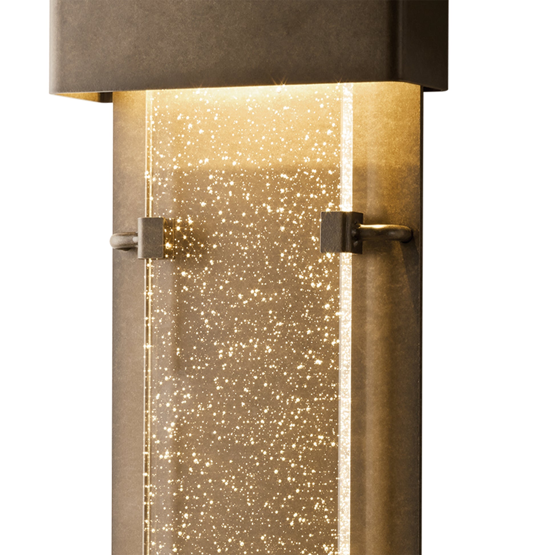Ursa Large LED Outdoor Sconce by Hubbardton Forge featuring a sleek rectangular top and textured bubble-glass, highlighting quality craftsmanship.