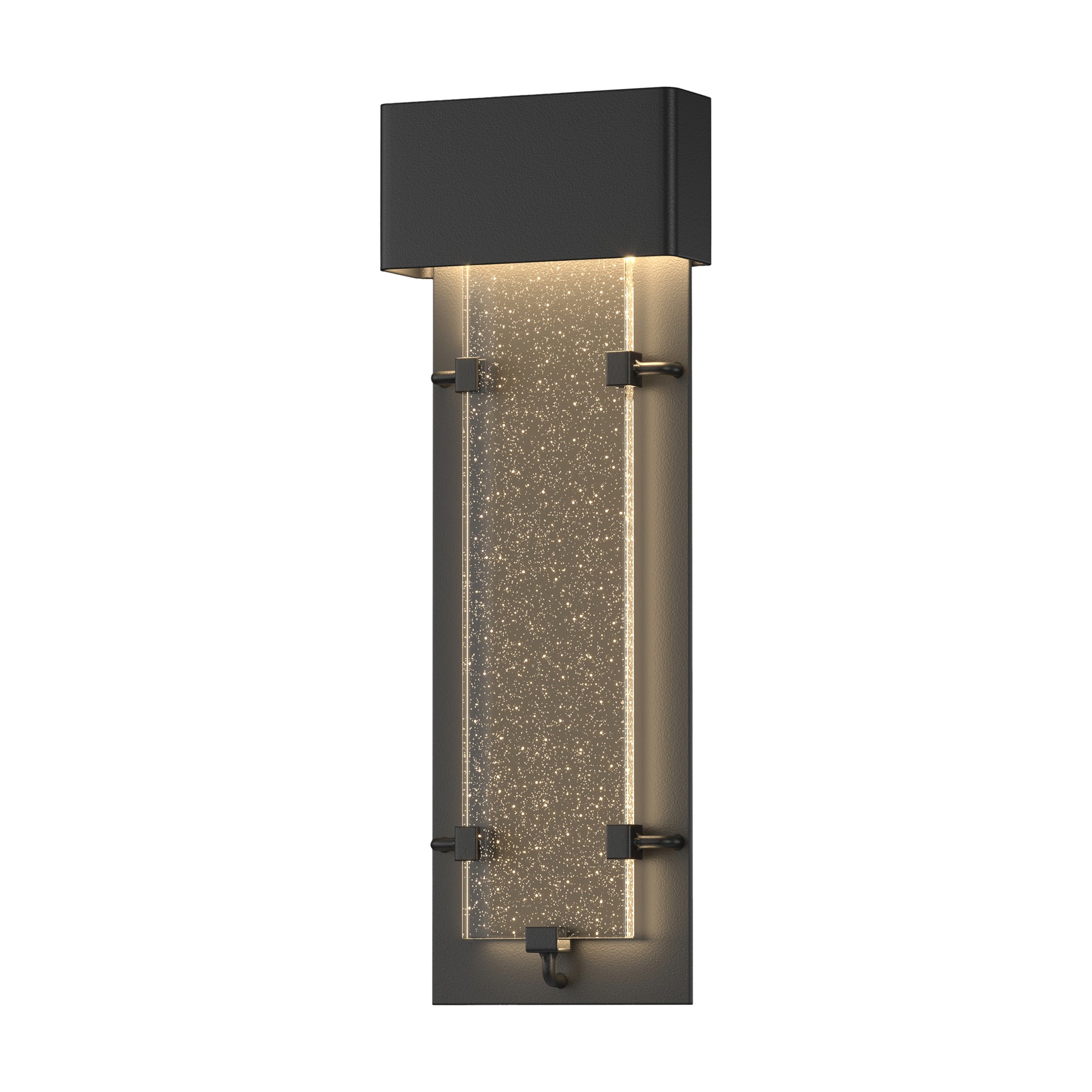 Close-up of the Ursa Large LED Outdoor Sconce by Hubbardton Forge, showcasing its dark frame and textured illuminated glass panel craftsmanship.