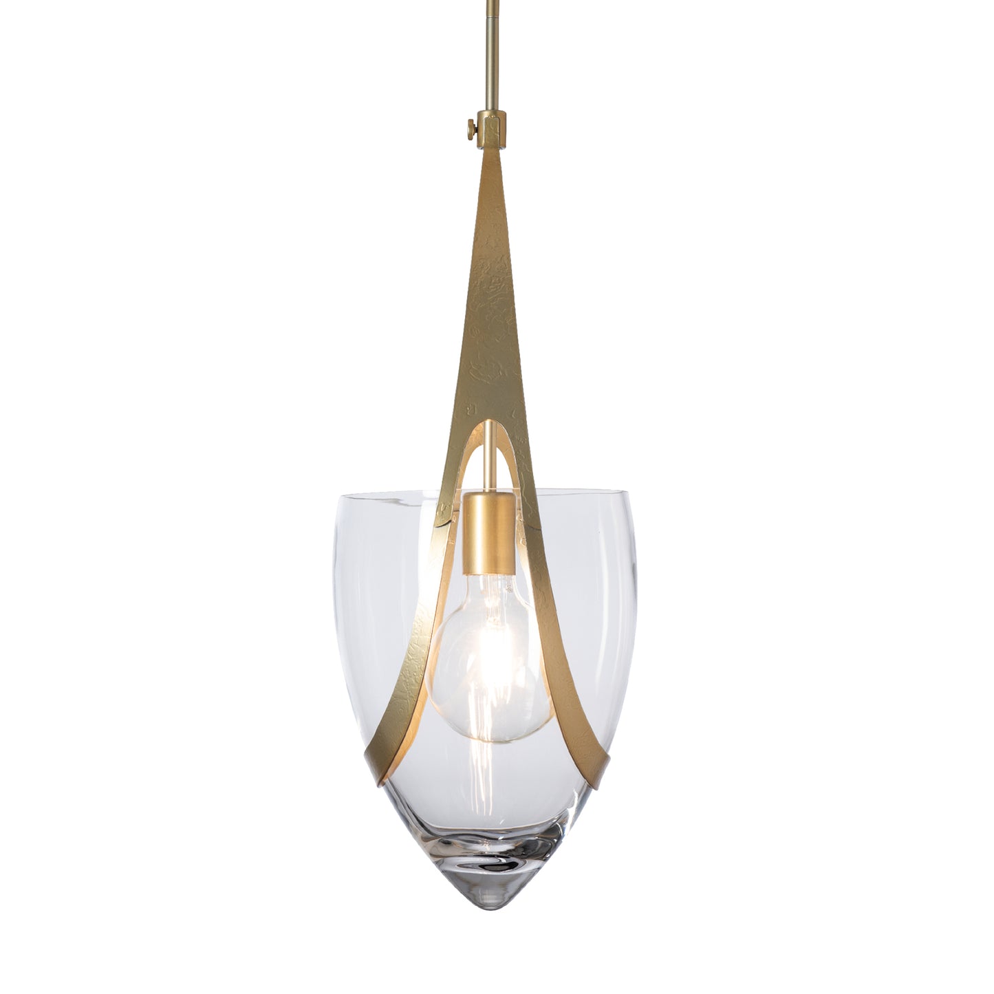 Close-up of the Vaso Pendant by Hubbardton Forge: modern brass frame, clear glass shade, and exposed bulb, crafted to complement fine American-made furniture.