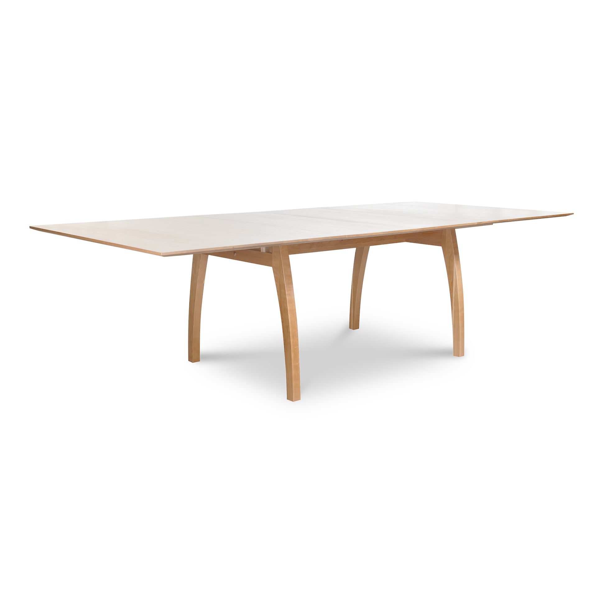 Vermont Modern Extension Trestle Table with curved legs and light cherry top by Lyndon Furniture.