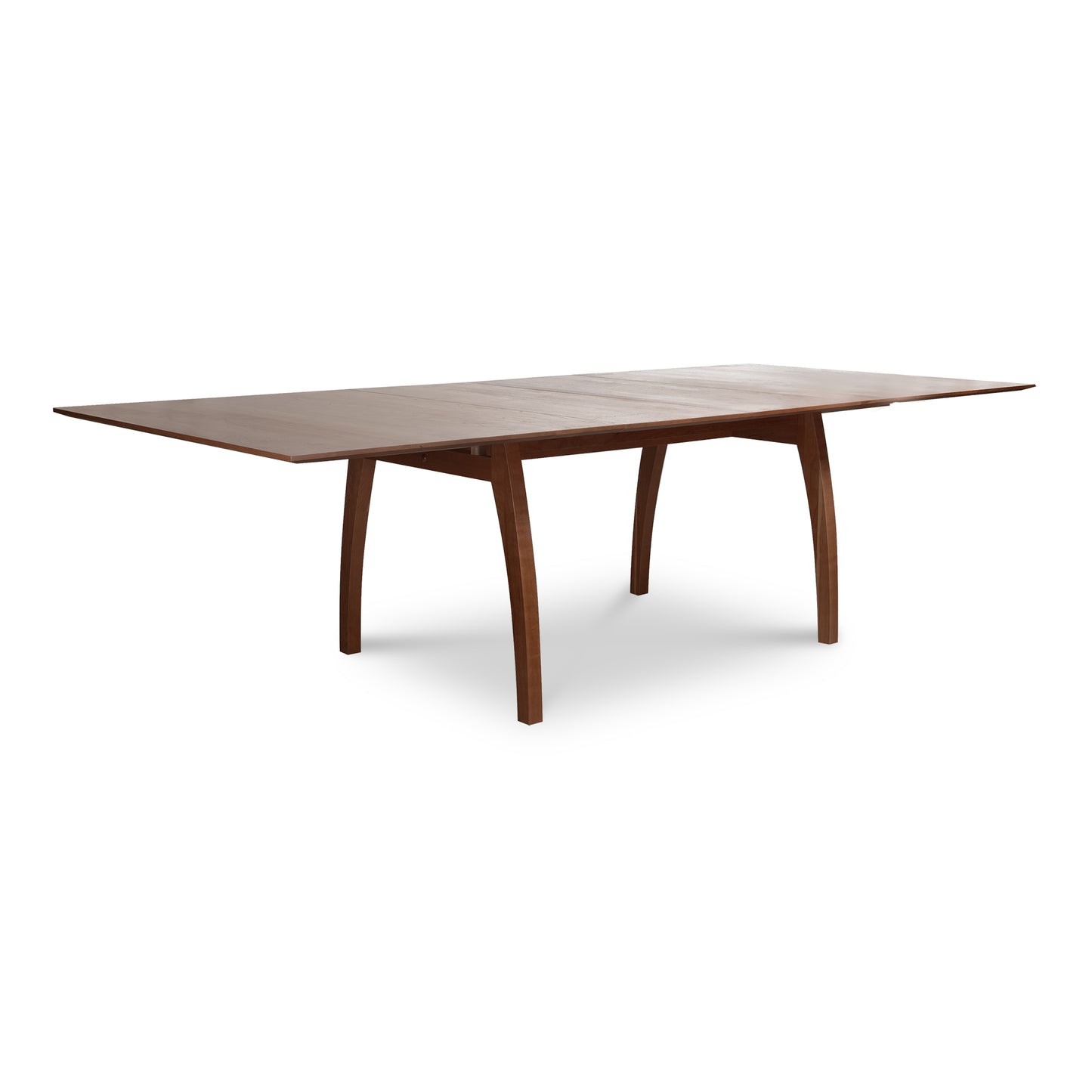 Solid wood Vermont Modern Extension Trestle Table by Lyndon Furniture with a smooth surface and elegantly curved legs.