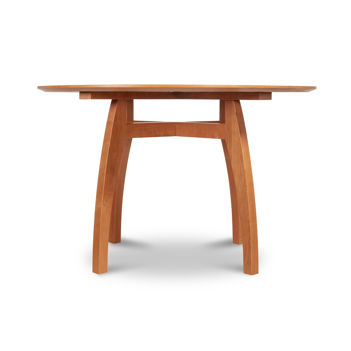 A round Lyndon Furniture Vermont Modern 48" Solid Top Pedestal Table - Floor Model with a wooden base, handmade in Vermont.