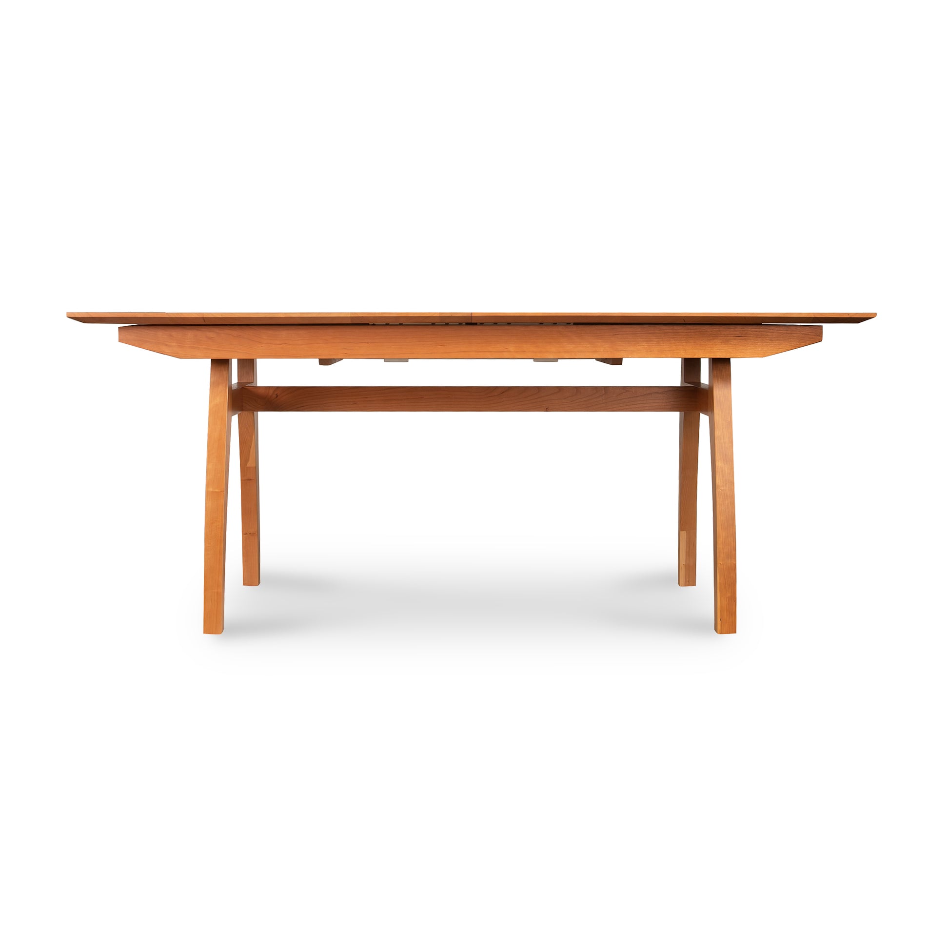 A high-end, handmade Vermont Modern Butterfly Extension Table - Floor Model with a wooden top by Lyndon Furniture.