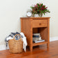 Vermont Shaker 1-Drawer Nightstand in cherry by Maple Corner Woodworks, with subtle decor on top, expertly crafted American made bedroom furniture.