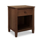A Maple Corner Woodworks Vermont Shaker 1-Drawer Enclosed Shelf Nightstand with a smooth finish made from natural cherry, featuring one drawer and an open shelf below. The stand is set against a plain white background, showcasing the fine Vermont craftsmanship.