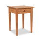 Vermont Shaker Bedside Table by Maple Corner Woodworks, featuring a square top, four sturdy legs, and a single drawer with a round knob, crafted from sustainably harvested solid woods.