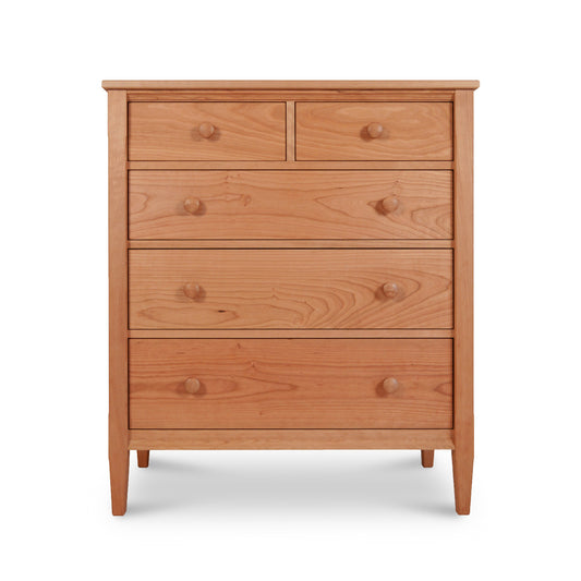 A Vermont Shaker 5-Drawer Chest by Maple Corner Woodworks, handcrafted from natural solid wood, on a plain background.