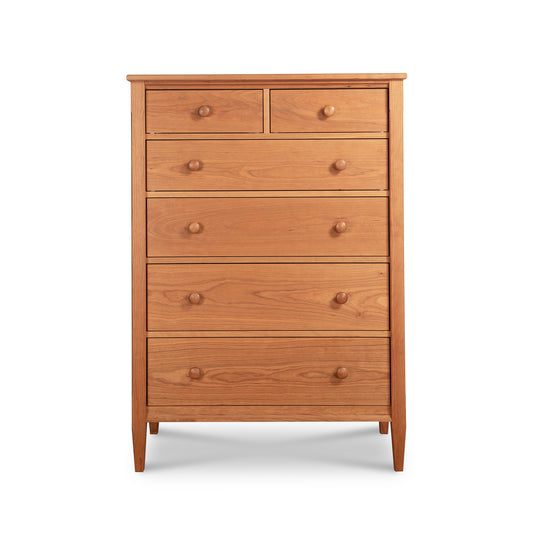 Vermont Shaker 6-Drawer Chest by Maple Corner Woodworks, tall with natural wood finish and round knobs, highlights expert Vermont craftsmanship.