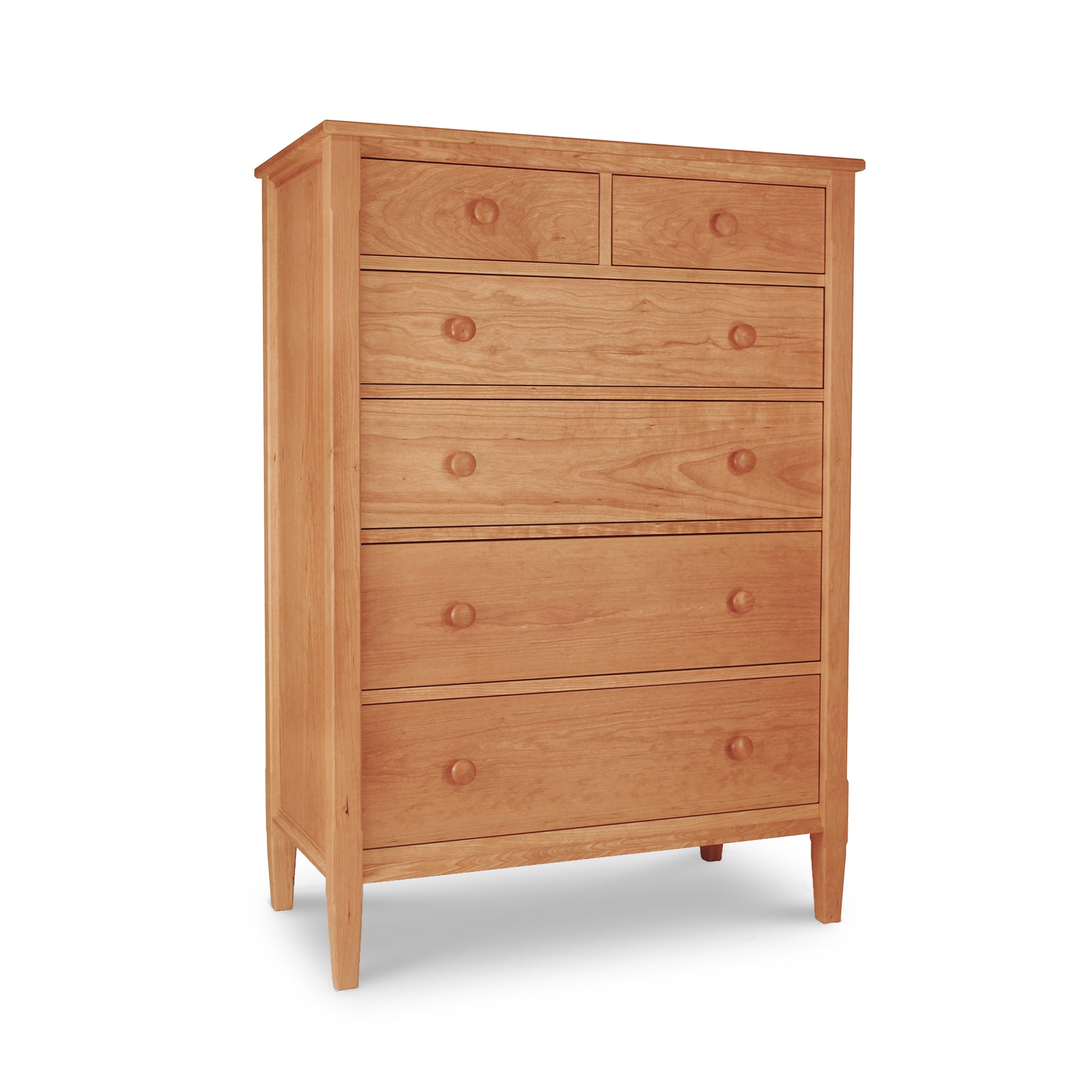 A Maple Corner Woodworks Vermont Shaker 6-Drawer Chest made of hardwoods, providing ample bedroom storage, showcased on a white background.