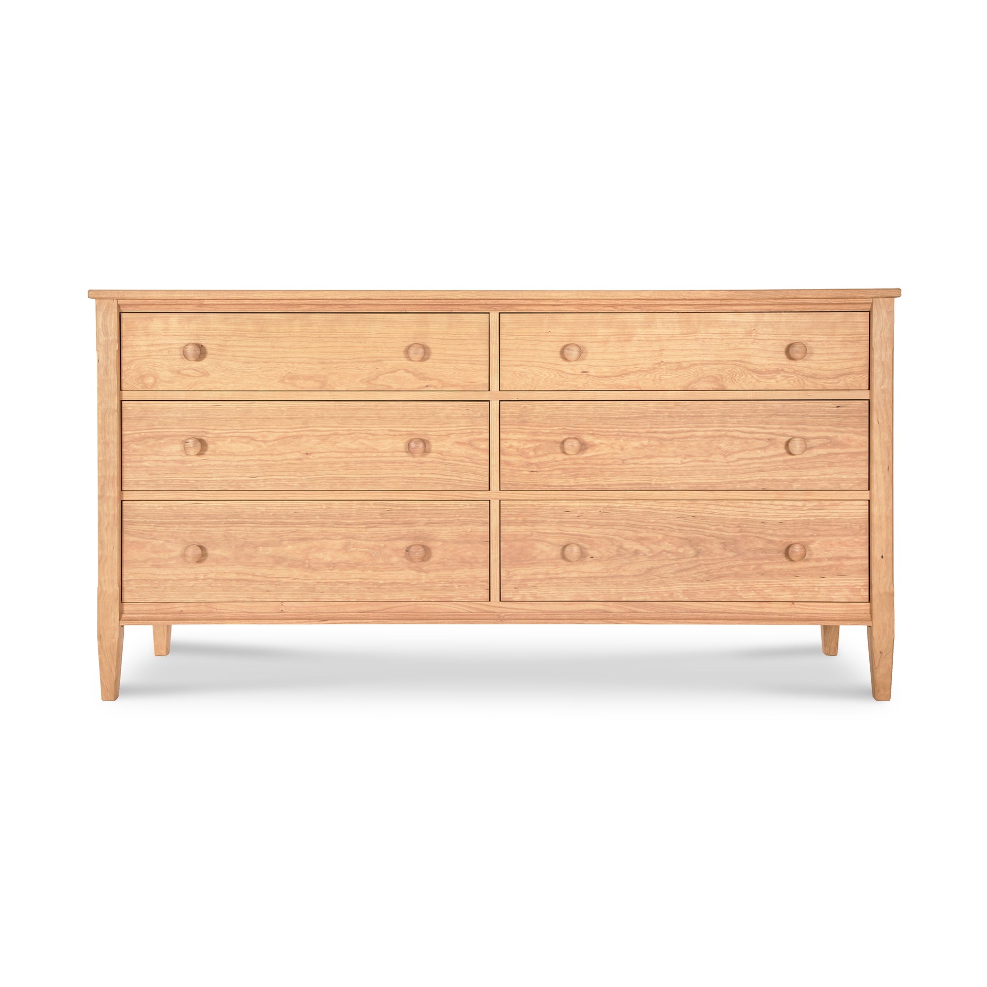 A Vermont Shaker 6-Drawer Dresser made by Maple Corner Woodworks, featuring multiple drawers, displayed against a clean white background.