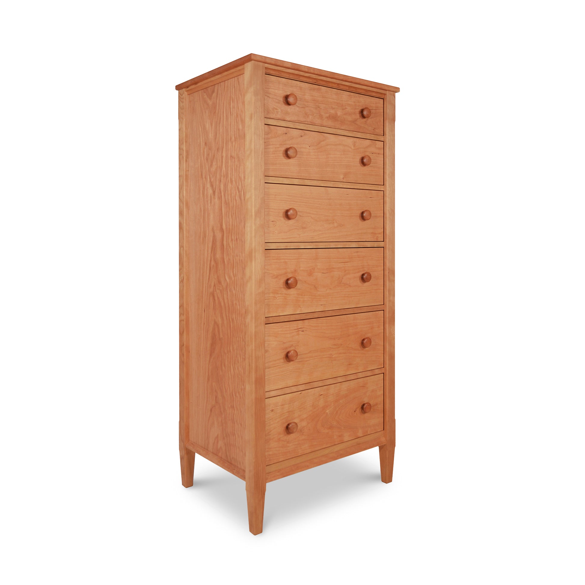 Vermont Shaker Lingerie Chest by Maple Corner Woodworks - Six Drawer, Solid Wood Design. Classic Vermont Shaker Furniture with Tapered Legs and Rounded Wooden Knobs. Premium Handmade American Made Furniture Perfect for Bedroom Storage. Visible Cherry or Walnut Wood Grain Enhances Elegance.