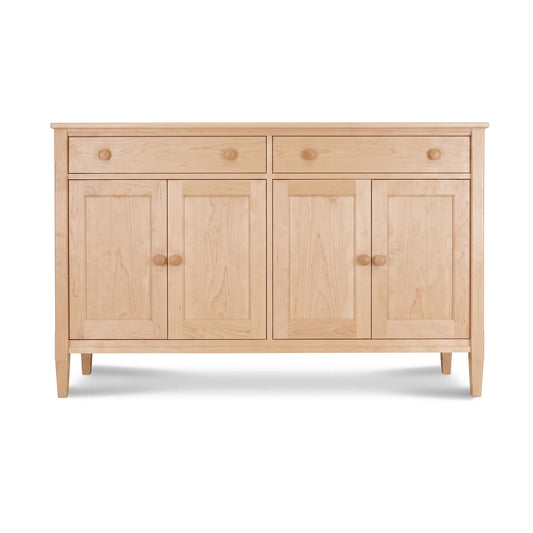 Vermont Shaker Large 60″ Sideboard by Maple Corner Woodworks featuring four doors, two drawers, round knobs, and sturdy legs in solid hardwood.