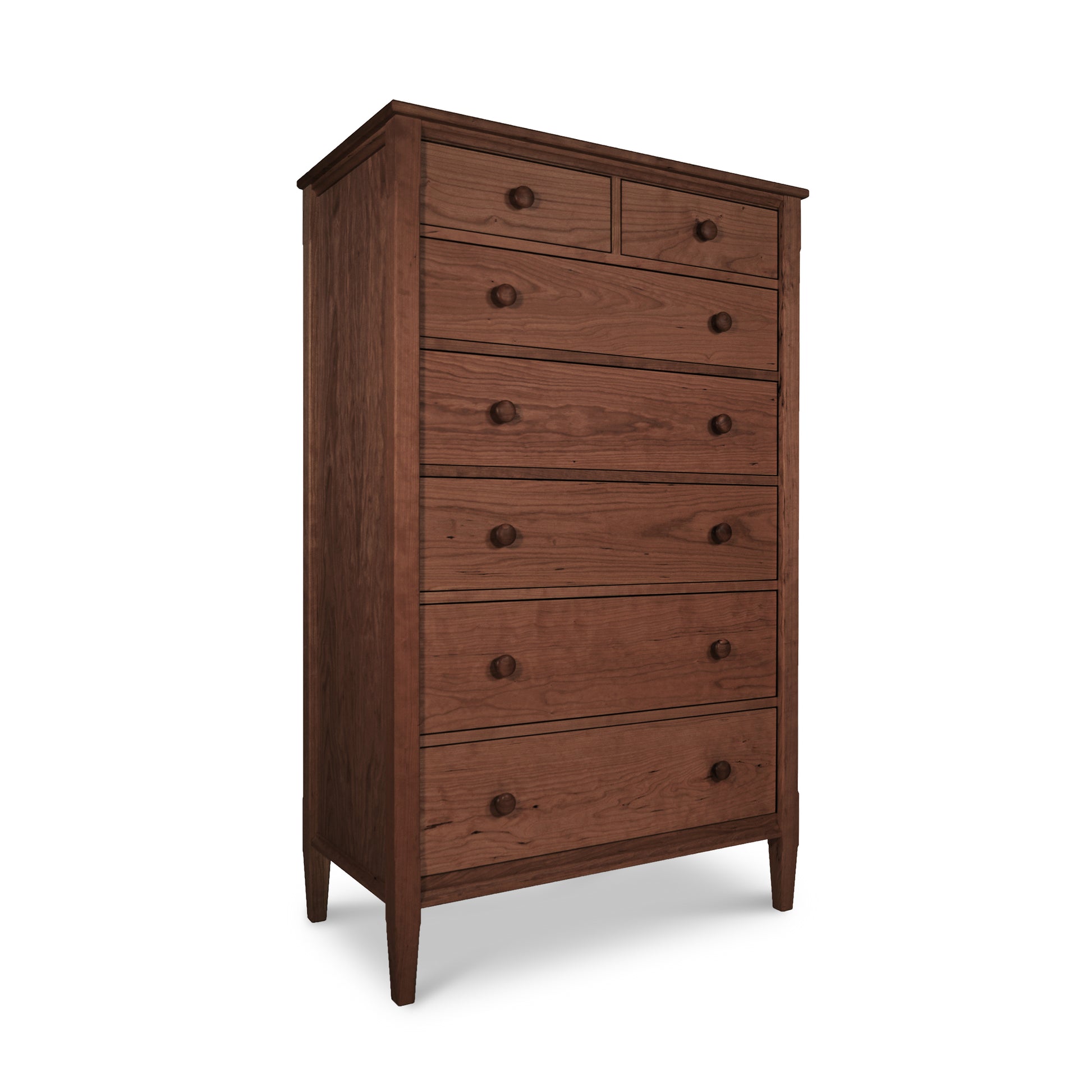 The Maple Corner Woodworks Vermont Shaker 7-Drawer Chest is a stunning piece of bedroom furniture in a rich dark brown color.