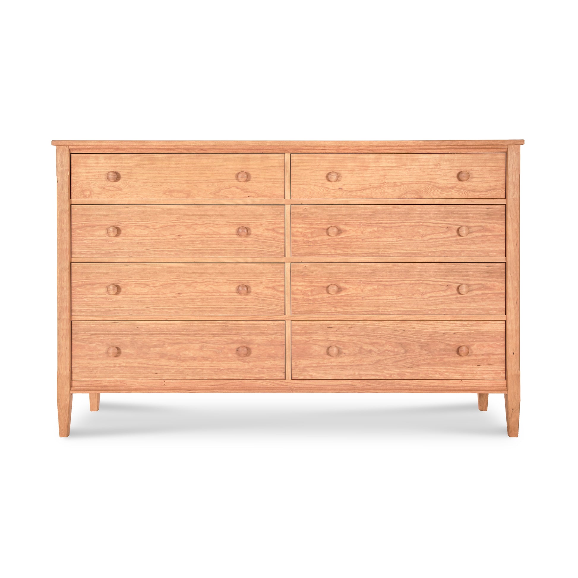 A Maple Corner Woodworks Vermont Shaker 8-Drawer Dresser made of wood, displayed on a white background.
