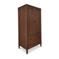 This Maple Corner Woodworks Vermont Shaker armoire features solid wood construction and two drawers.