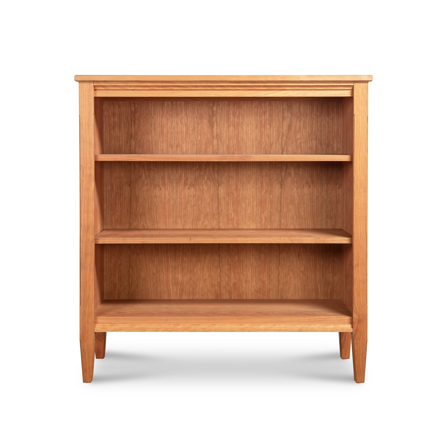 Vermont Shaker Bookcase with three shelves in a natural finish, crafted from sustainably harvested hardwoods.