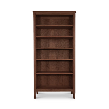 Vermont Shaker Bookcase by Maple Corner Woodworks showcasing five shelves, crafted from dark, sustainably harvested hardwoods.