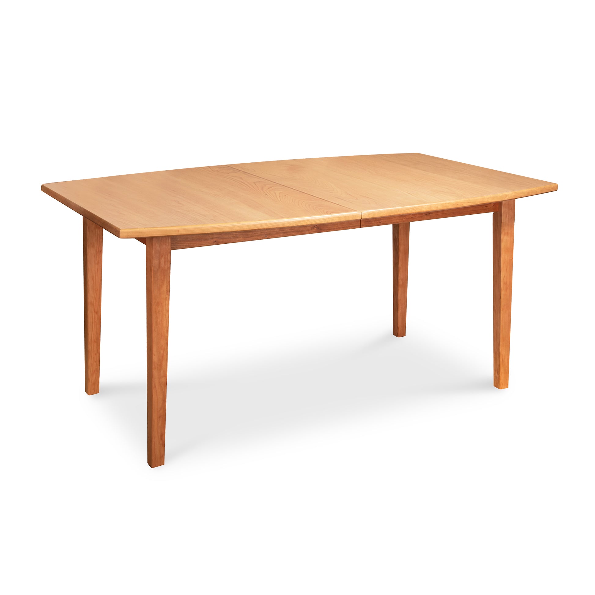 Vermont Shaker Boat Top Extension Dining Table by Maple Corner Woodworks with four straight legs and a light brown finish, American made furniture.