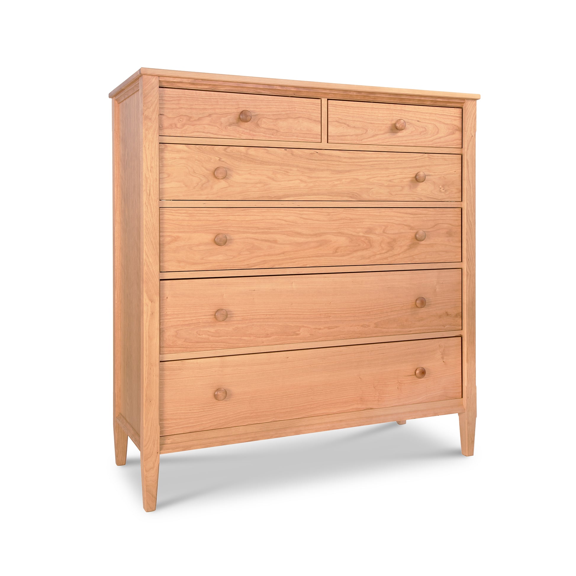 An extra wide Maple Corner Woodworks Vermont Shaker Chest of drawers made from natural hardwood furniture, placed on a white background.