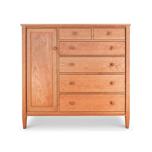 A Maple Corner Woodworks Vermont Shaker Gent's Chest made of solid wood, featuring a combination of drawers and a cabinet door, isolated on a white background.