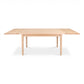 Rectangular Vermont Shaker Harvest Extension Dining Table by Maple Corner Woodworks in a light finish, showcasing handcrafted American craftsmanship.