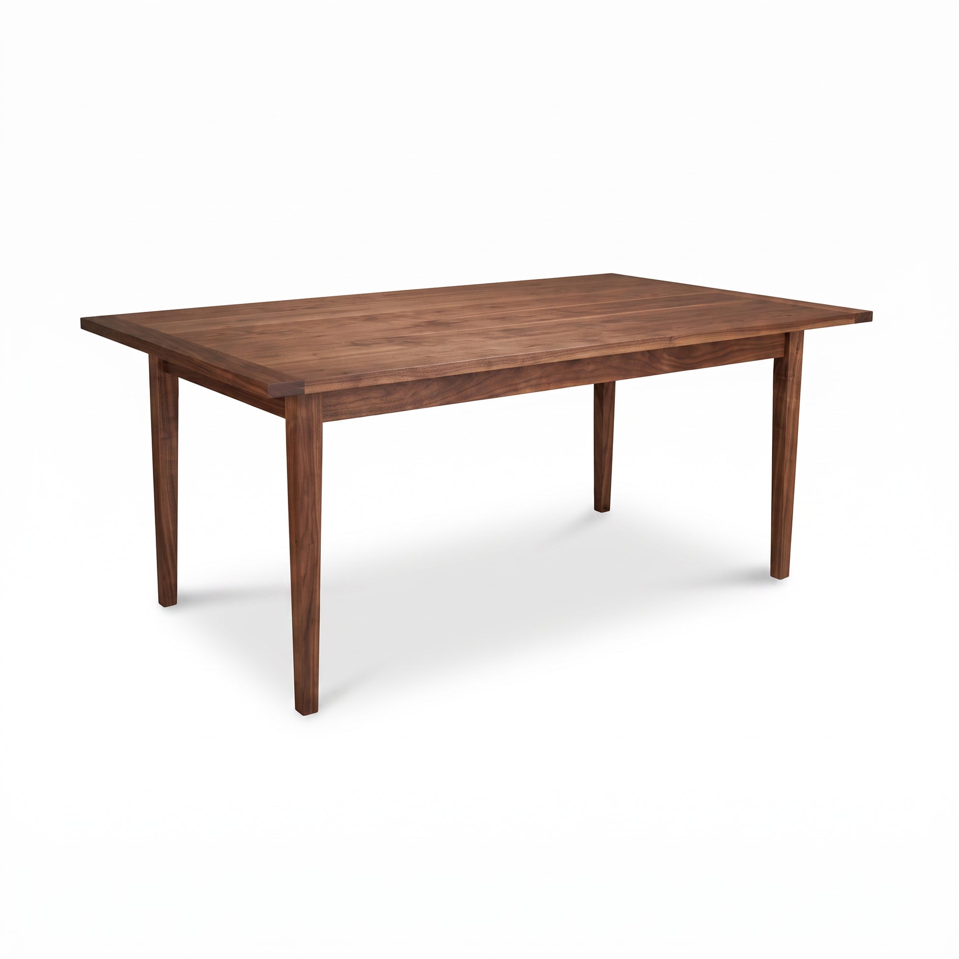 Vermont Shaker Solid Top Harvest Table by Maple Corner Woodworks features classic American craftsmanship and a smooth wood finish.