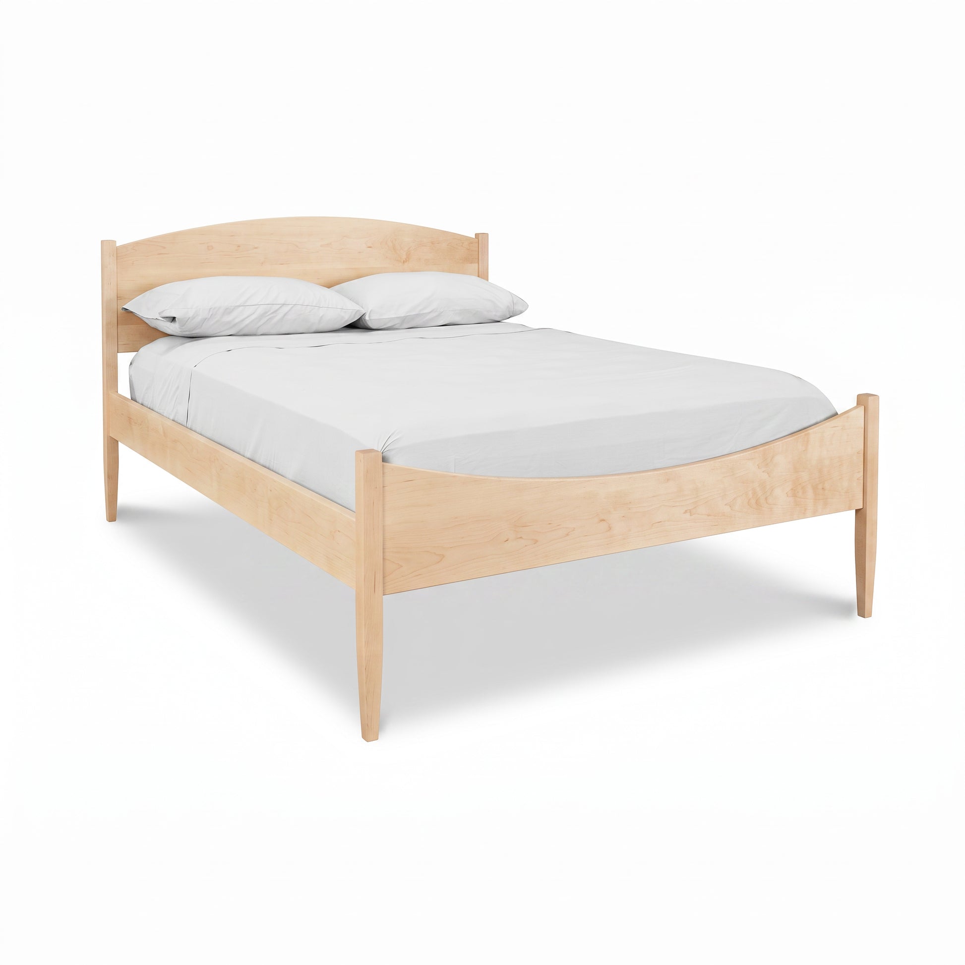 Vermont Shaker Moon Bed by Maple Corner Woodworks in maple wood, showcasing fine craftsmanship and elegant design with white bedding and two pillows.