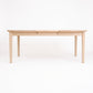 Vermont Shaker Oval Extension Dining Table by Maple Corner Woodworks, featuring four legs and elegant craftsmanship in solid wood.