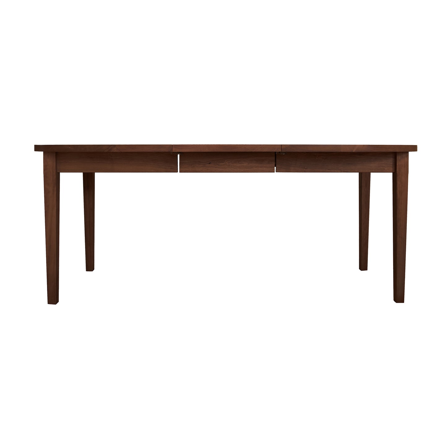 The Vermont Shaker Oval Extension Dining Table by Maple Corner Woodworks is a handcrafted wooden dining table that features two drawers.