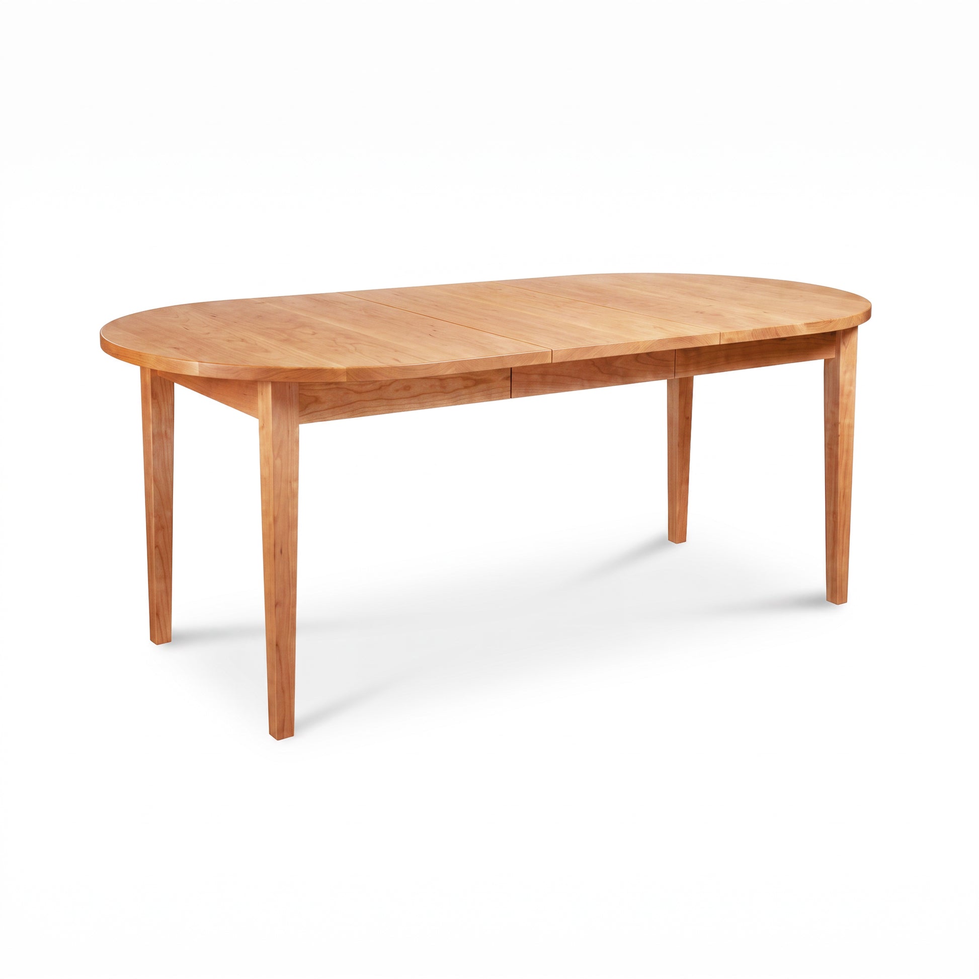 Handcrafted Vermont Shaker Oval Extension Dining Table by Maple Corner Woodworks, featuring expert craftsmanship and elegant American hardwood design.