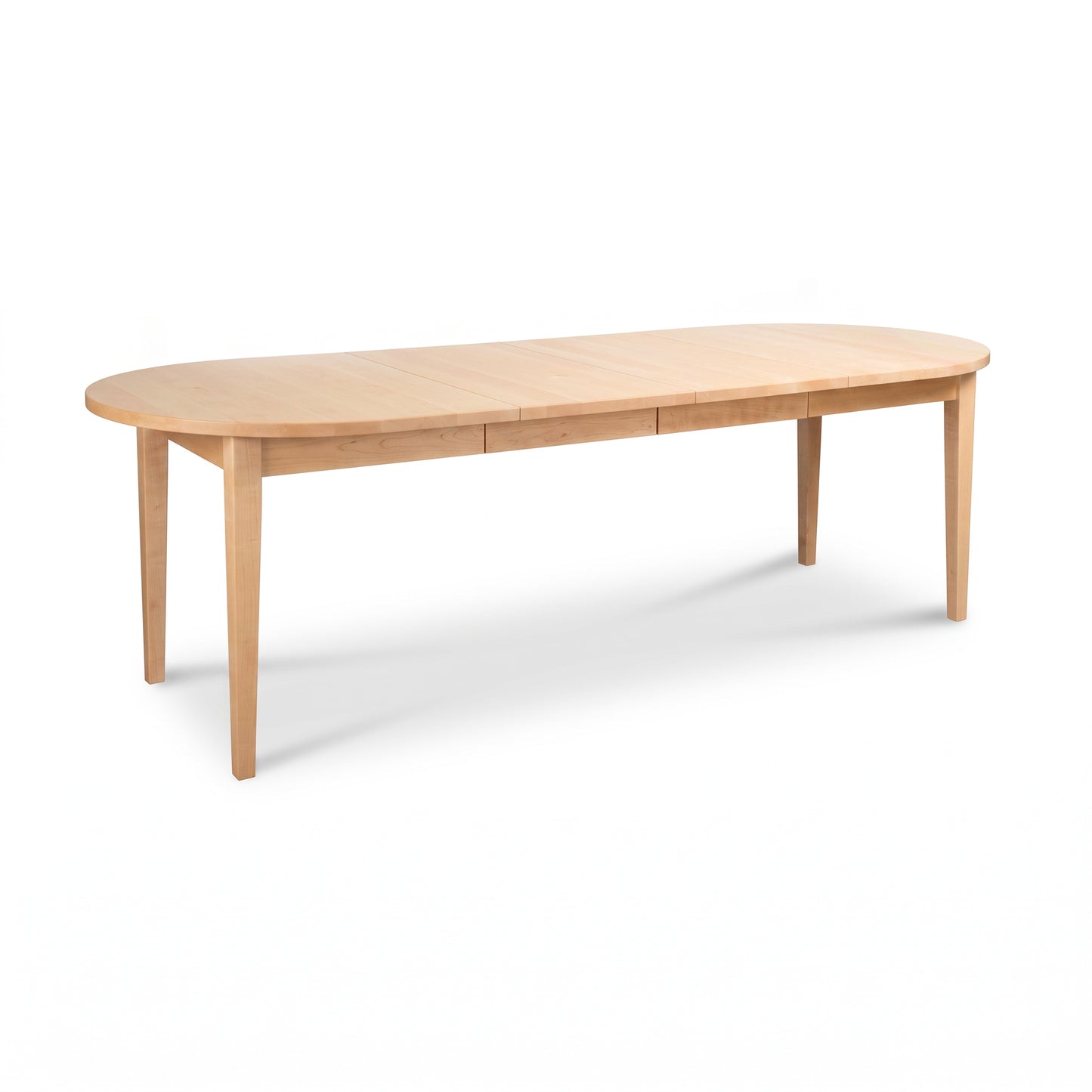 Vermont Shaker Oval Extension Dining Table by Maple Corner Woodworks with straight legs, crafted from solid wood in a classic Shaker style.