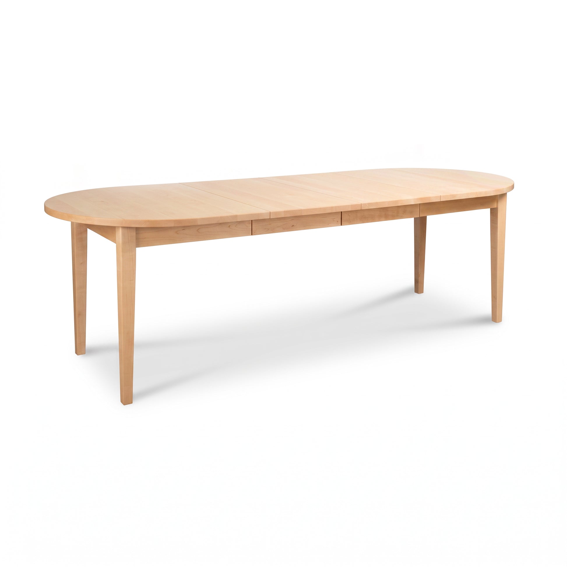 Vermont Shaker Oval Extension Dining Table by Maple Corner Woodworks with straight legs, crafted from solid wood in a classic Shaker style.