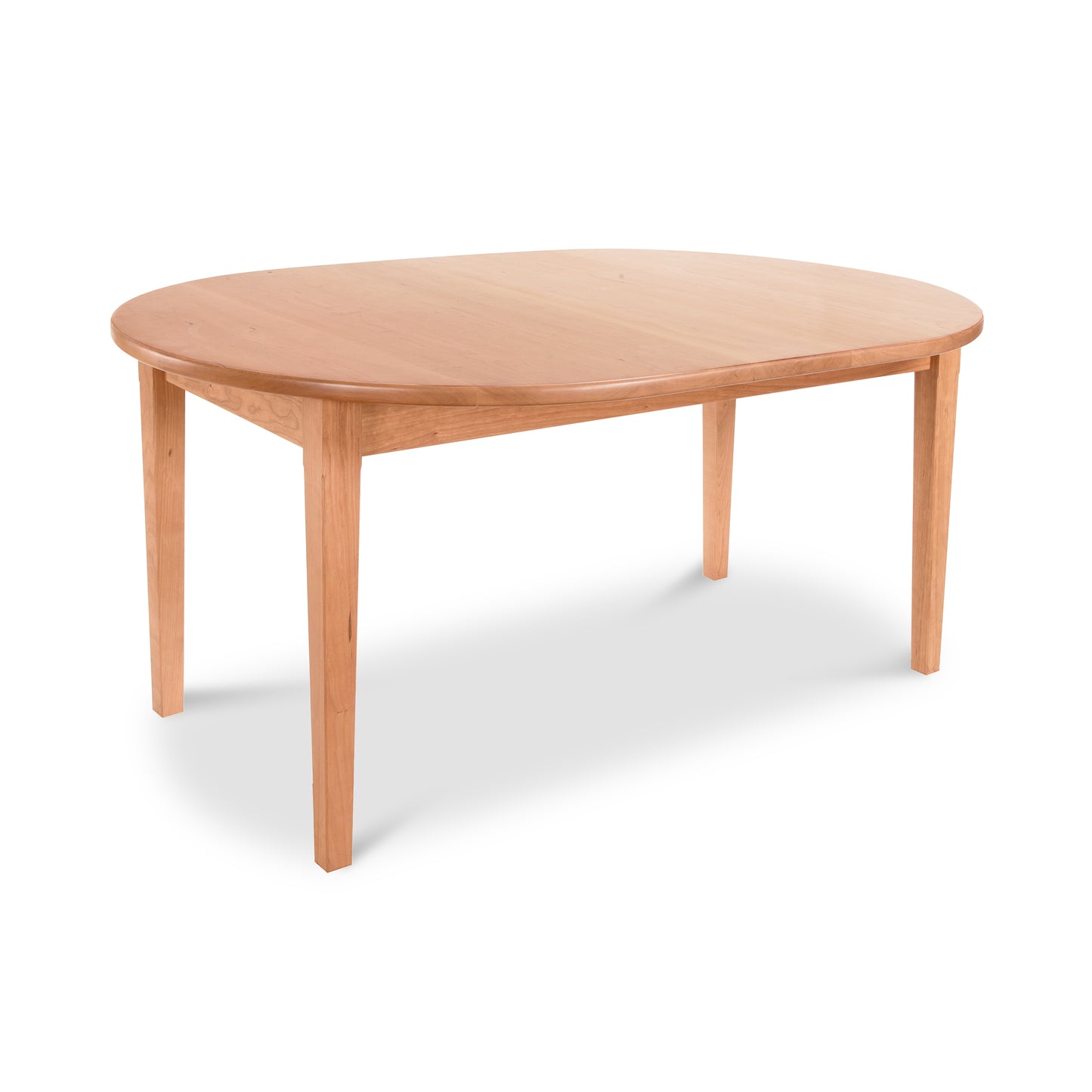 A simple Vermont Shaker Oval Solid Top Dining Table with four legs, displayed against a white background. The table's surface is smooth and light in color, highlighting its natural grain. Made by Maple Corner Woodworks.