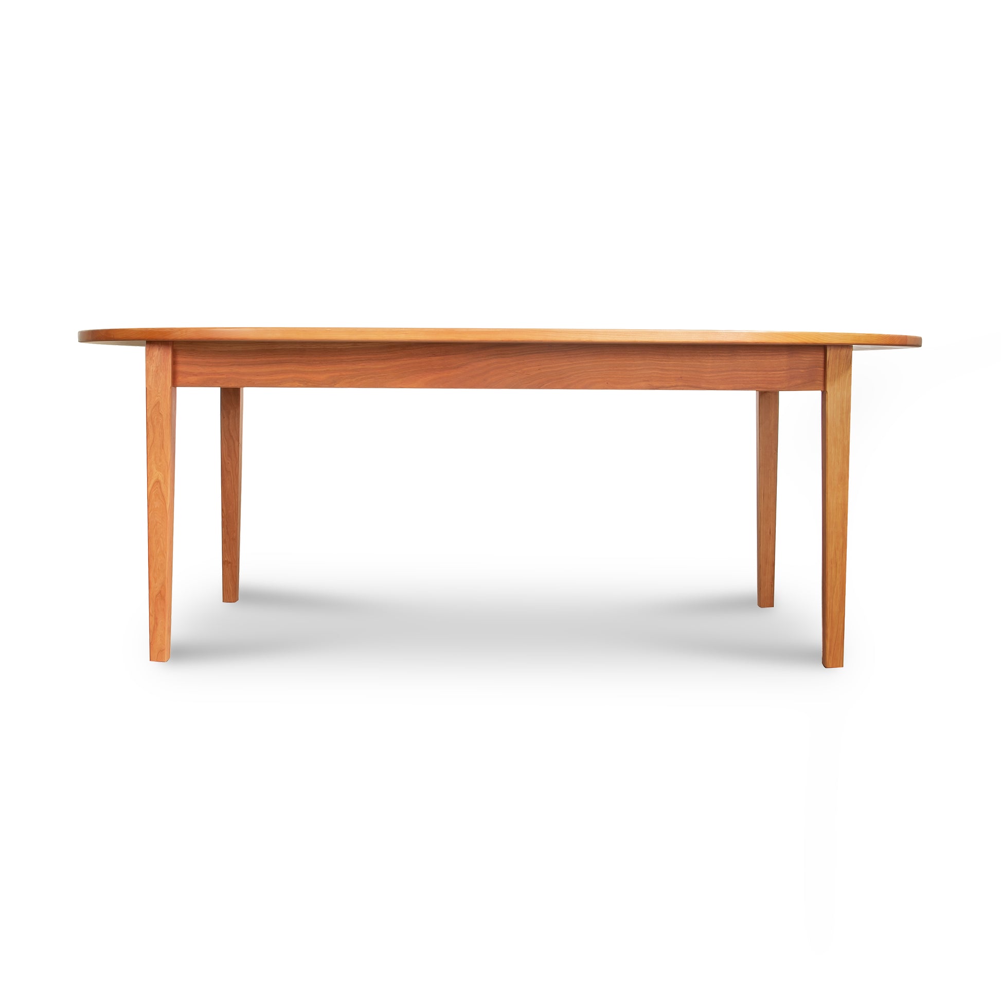 Vermont Shaker Oval Solid Top Dining Table by Maple Corner Woodworks with four legs and solid wood finish, American made, high quality craftsmanship.