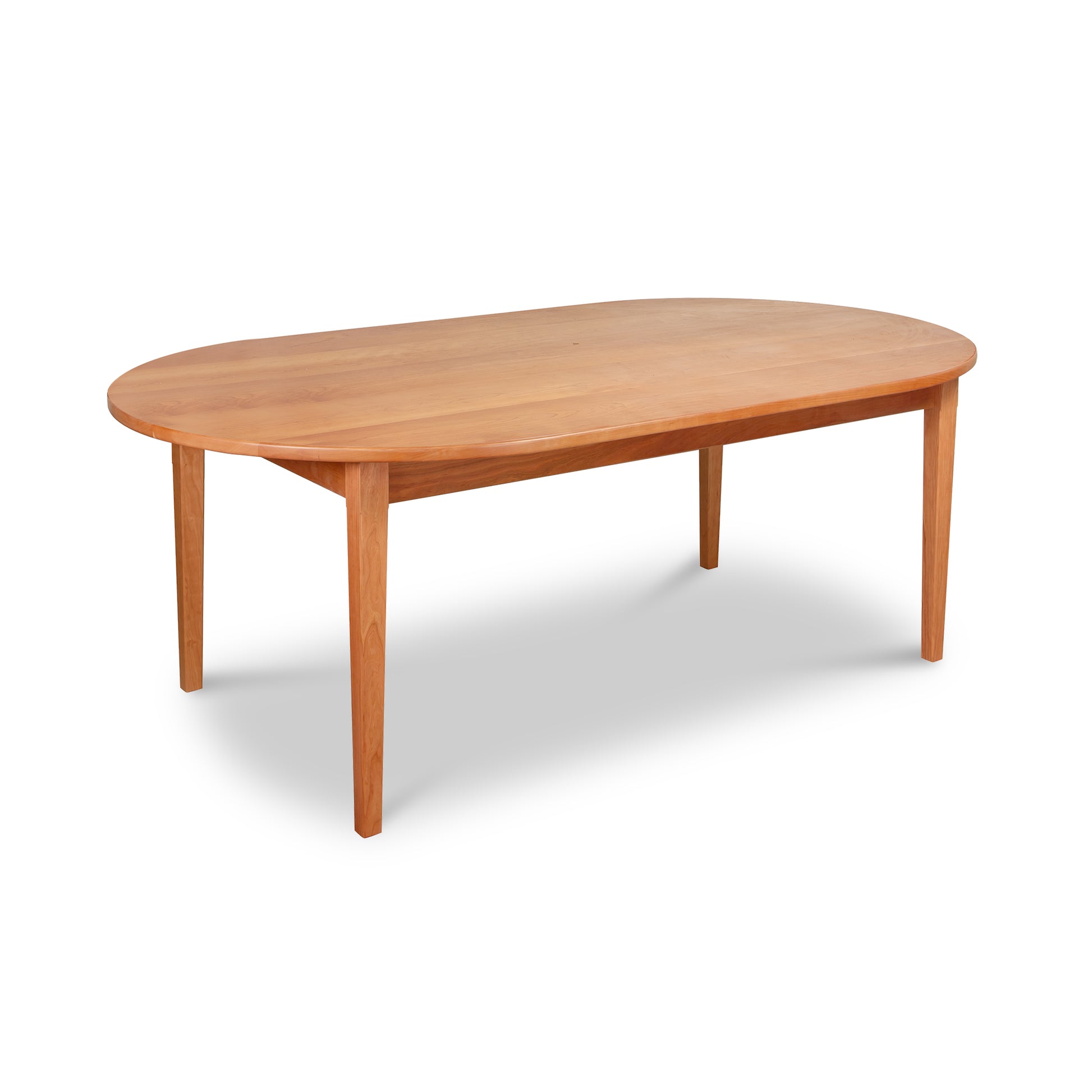 Vermont Shaker Oval Solid Top Dining Table by Maple Corner Woodworks features four straight legs and classic craftsmanship in solid wood.
